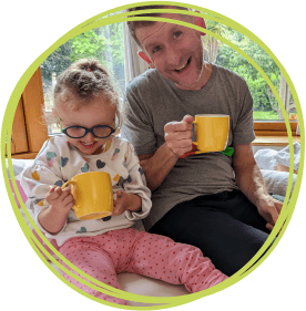 Dad Russ and Rosa enjoy a cuppa at Little Bridge House